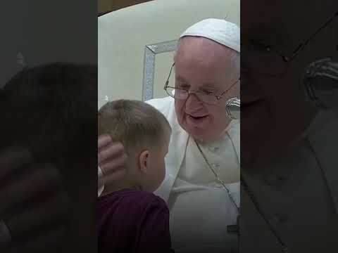 Little boy runs up stairs to Pope Francis's side | USA TODAY #Shorts