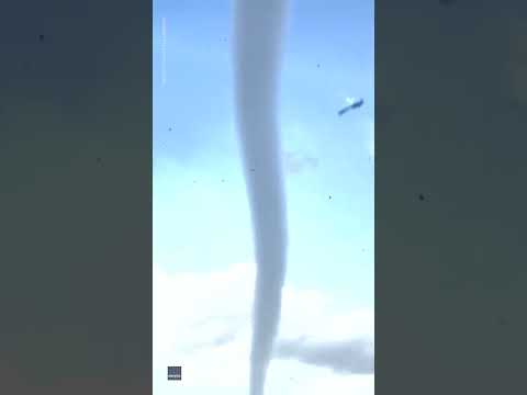 Two tornadoes touch down on either side of the highway | USA TODAY #Shorts